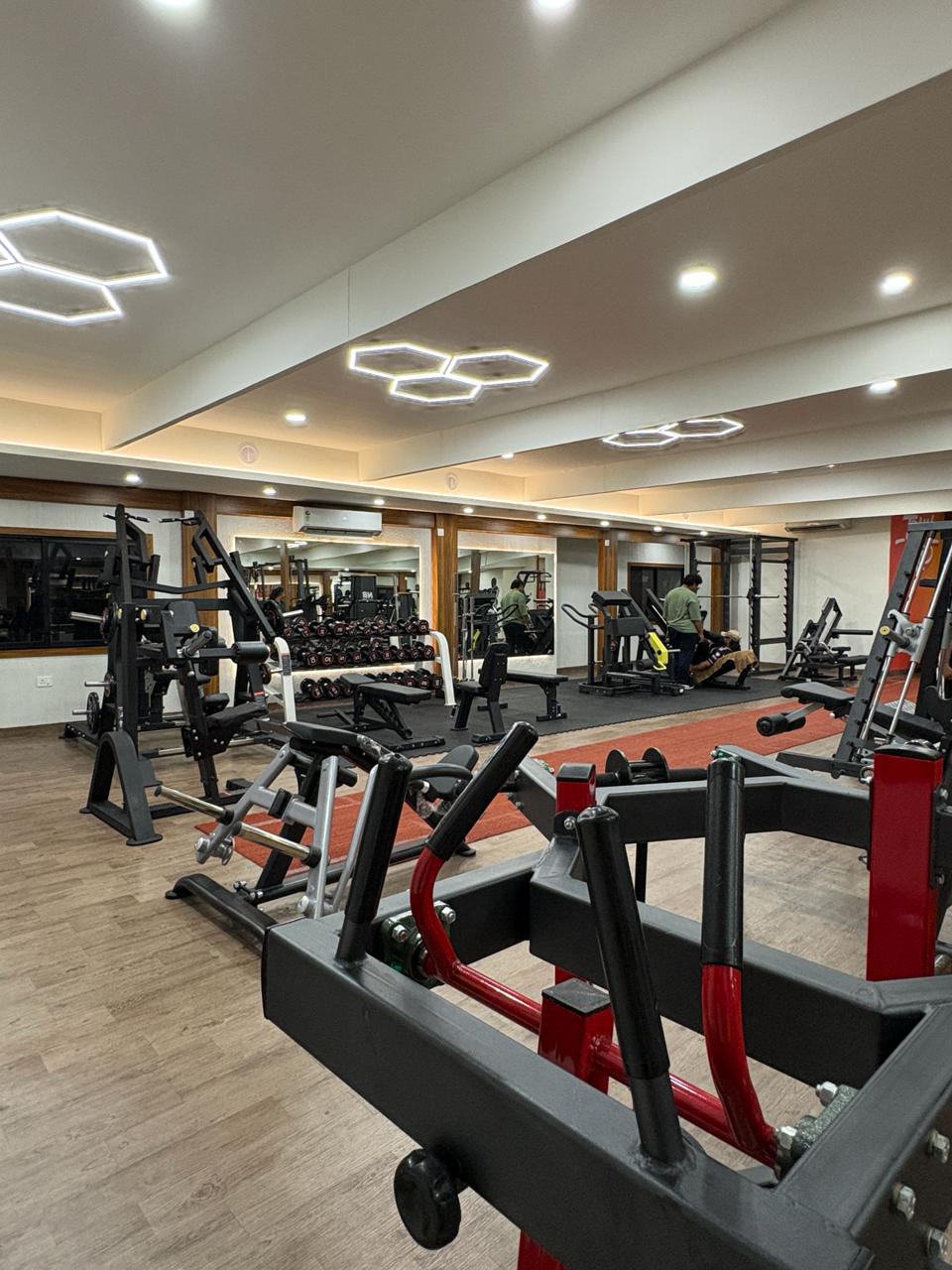 Inside Liger Fitness Vellimadukunnu - training area and premium equipment